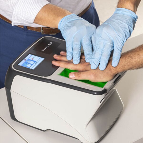 palm being scanned with assistance